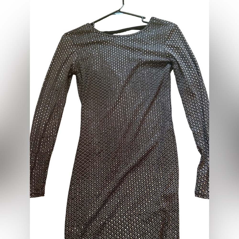 glittery midi dress with long sleeves and cut out back
